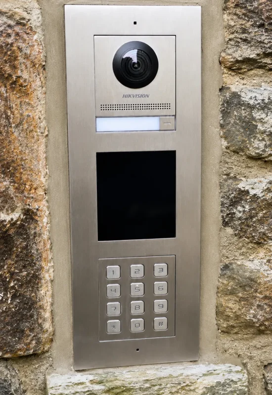 Stone wall with intercom panel